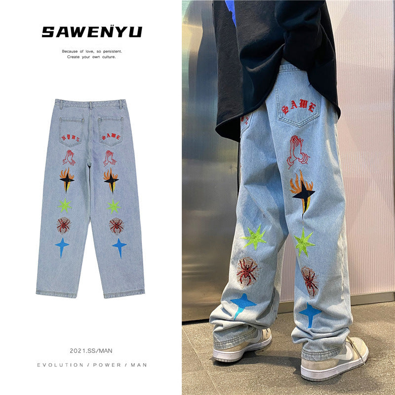 graffiti embroidered jeans