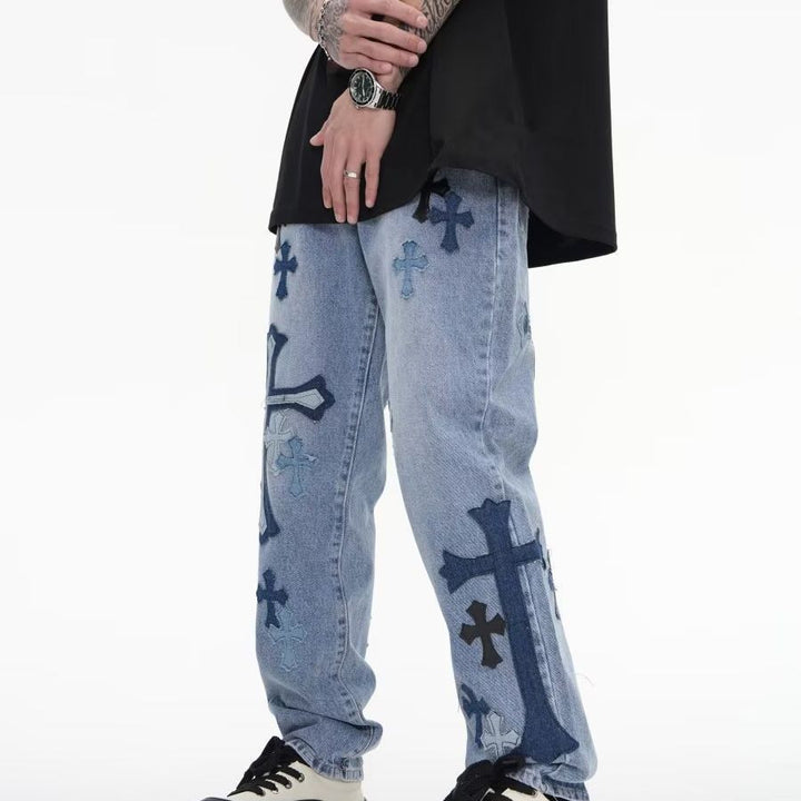 cross embroidered jeans