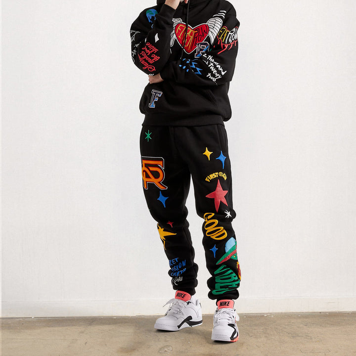 Graffiti character print casual trousers