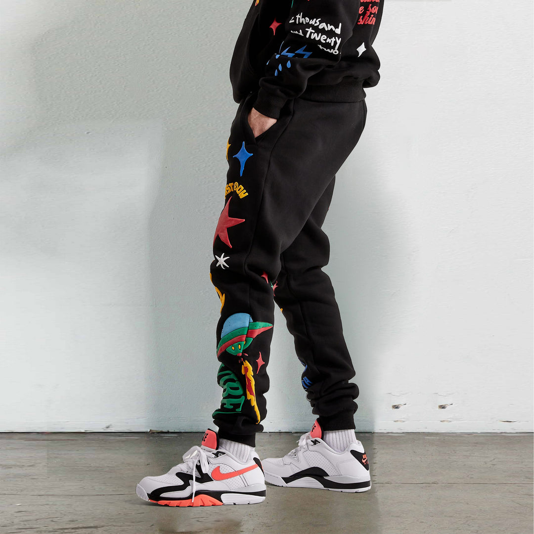 Graffiti character print casual trousers