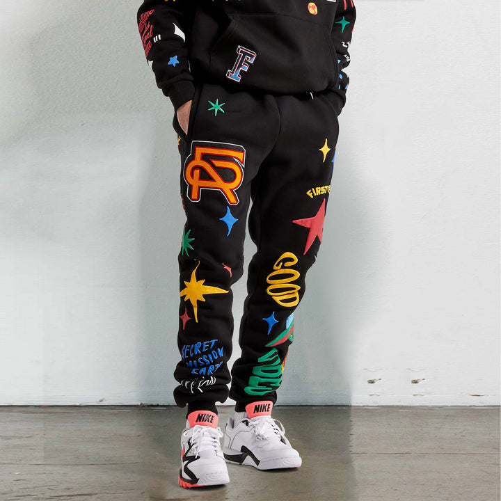 Graffiti character print casual trousers